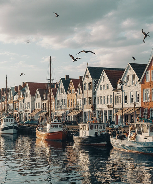 Colorful harbor houses and boats in Denmark